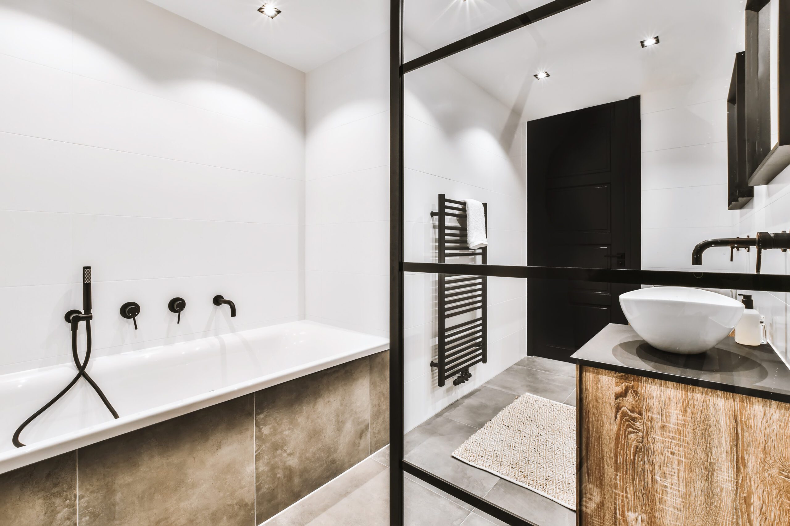 stylish-bathroom-with-oval-sink-and-mirror-2022-03-03-00-14-51-utc-scaled.jpg